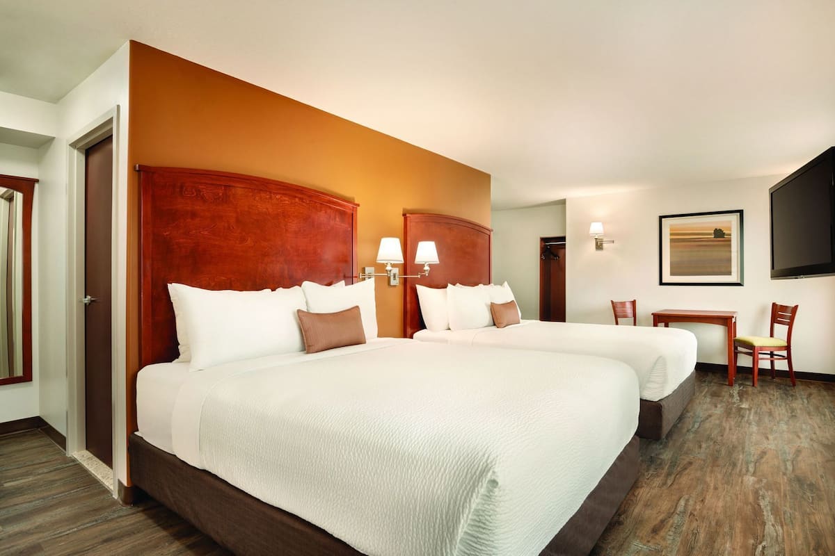 Pillow-top beds, blackout curtains, soundproofing, iron/ironing board