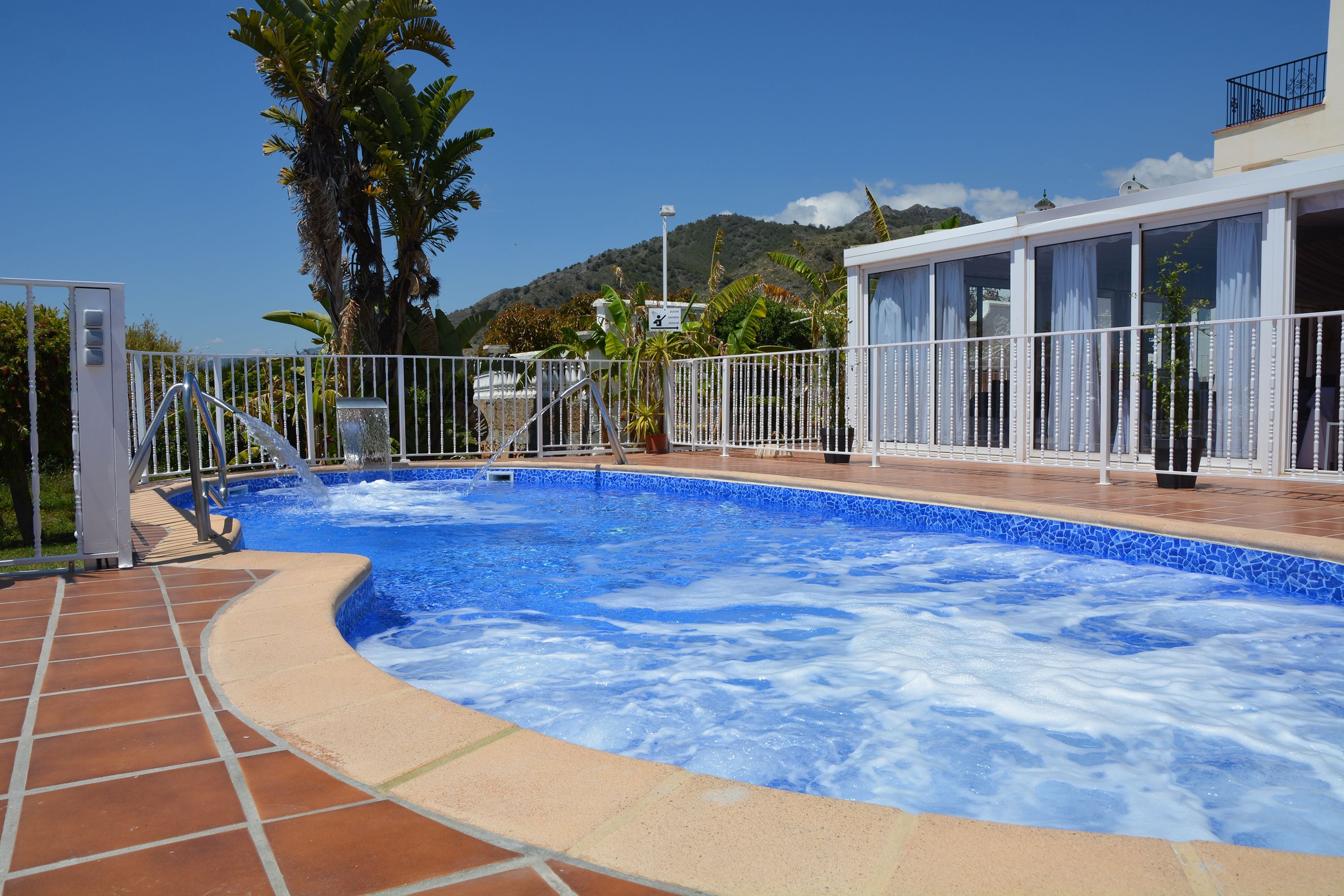 Seasonal outdoor pool, pool umbrellas, sun loungers