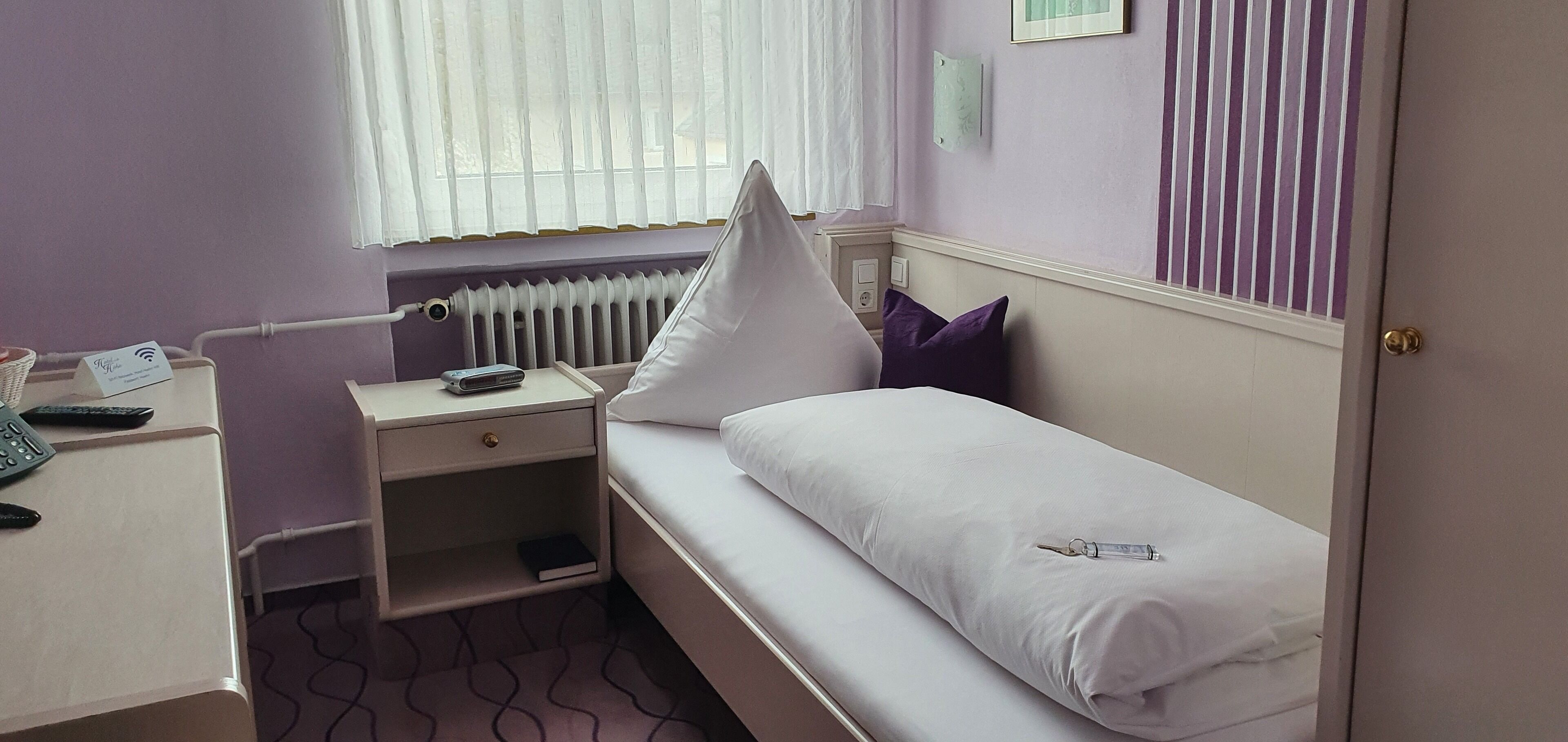 deluxe single room | in-room safe, desk, blackout curtains, iron/ironing board