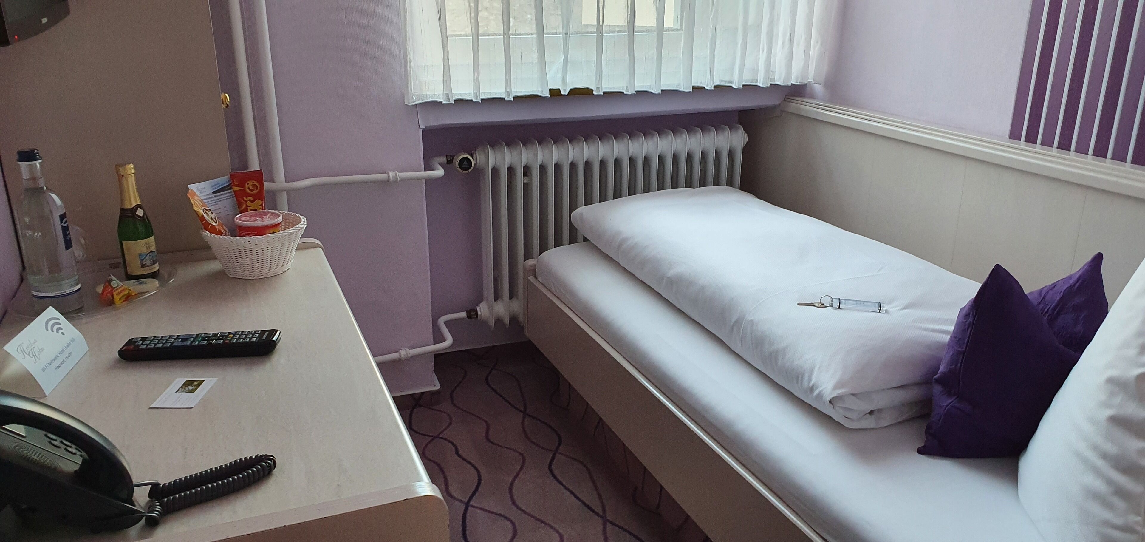 deluxe single room | in-room safe, desk, blackout curtains, iron/ironing board