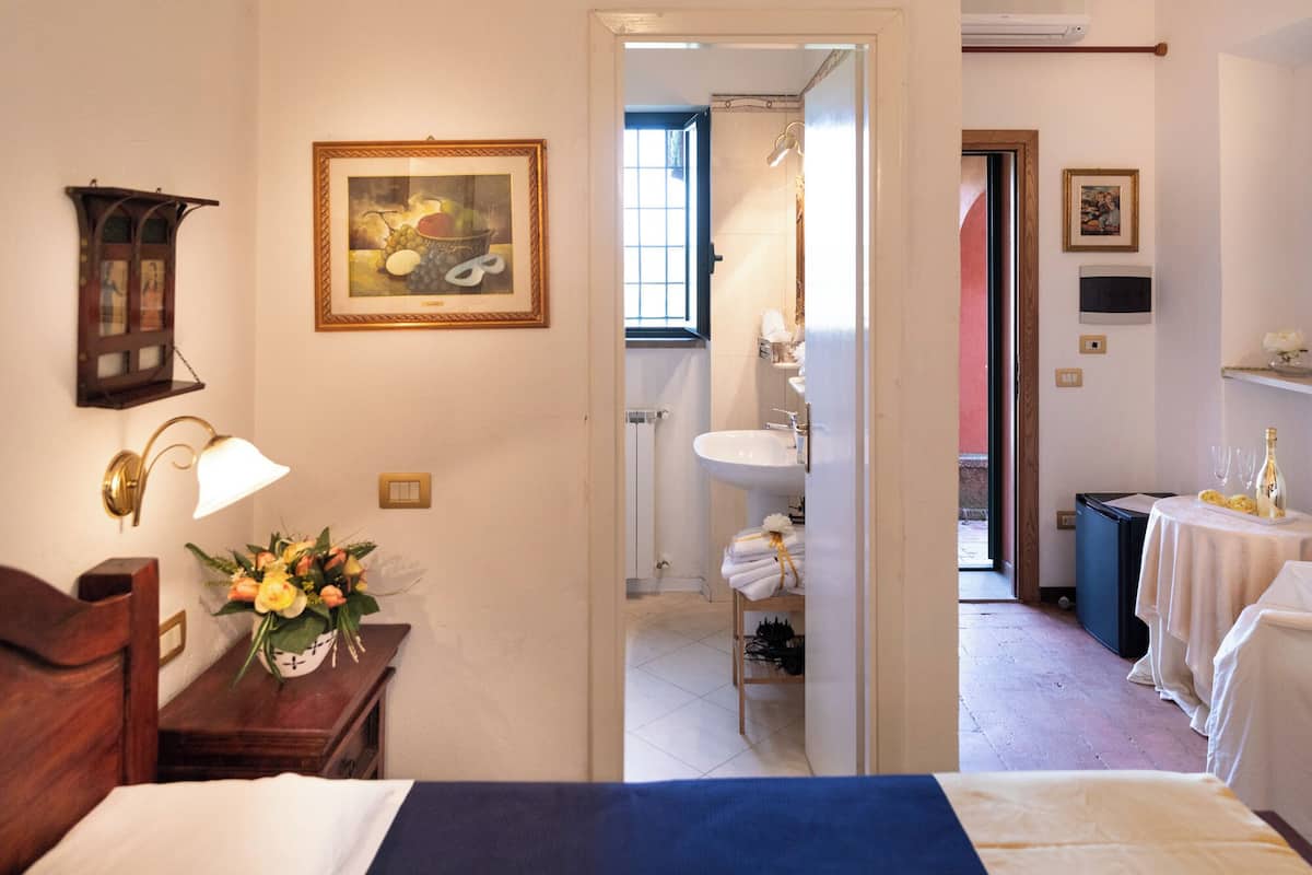 Superior Double Room | Minibar, individually decorated, desk, blackout curtains