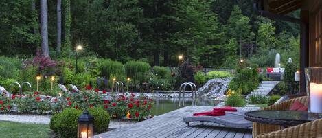 Outdoor pool, a natural pool, pool loungers