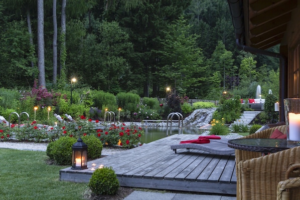 Outdoor pool, a natural pool, pool loungers - Hotel Burgfrieden (Gais)