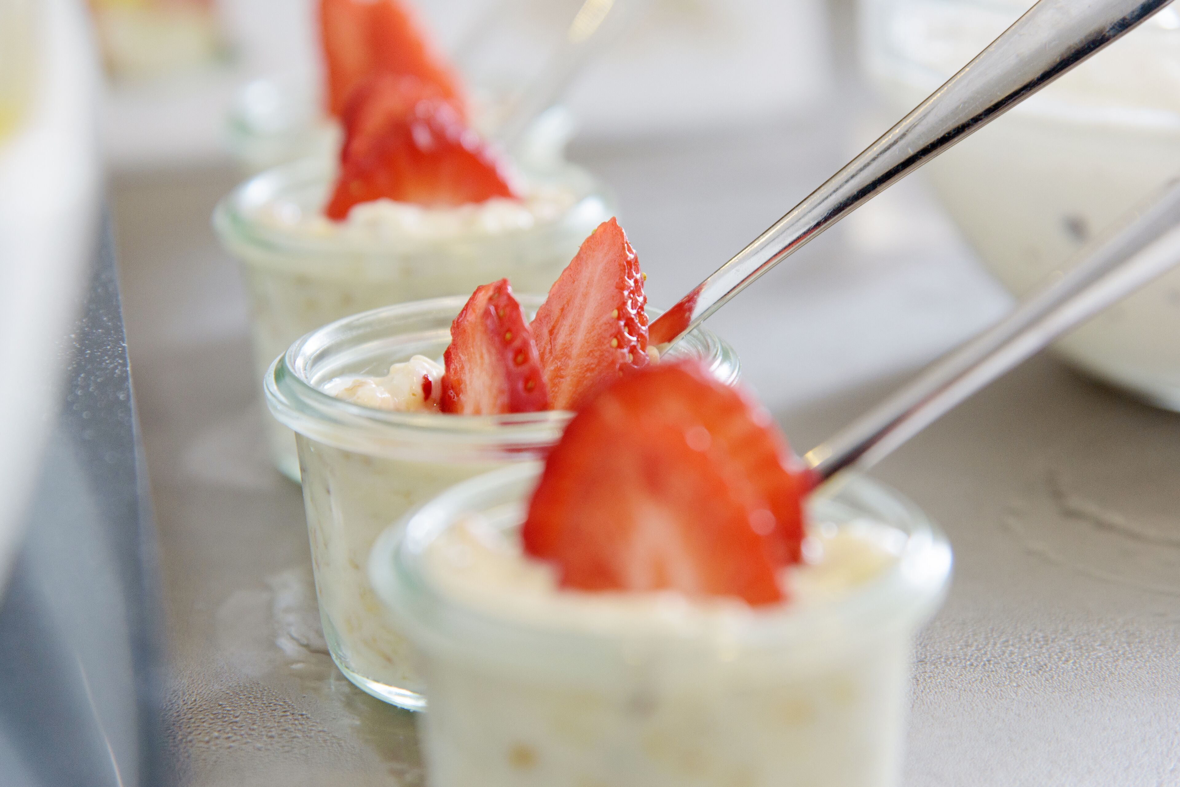A dessert with a strawberry on top.