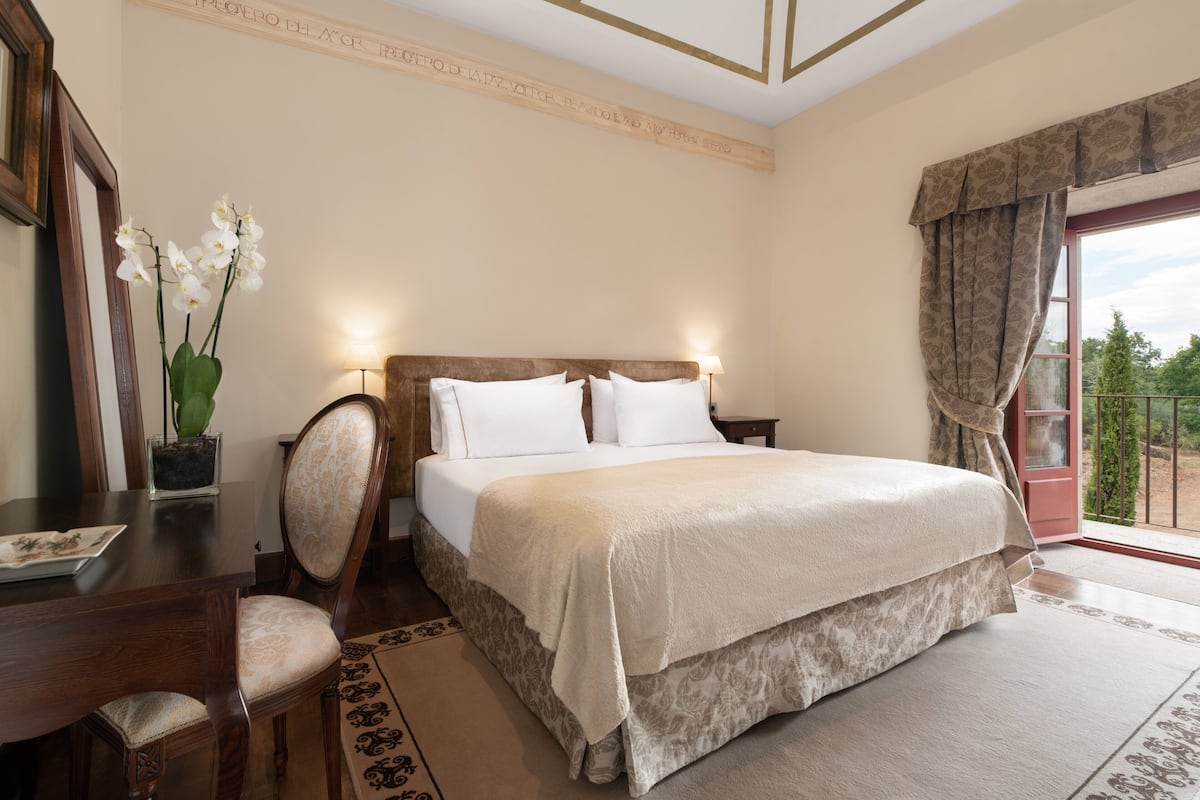1 habitación, ropa de cama de alta calidad y minibar