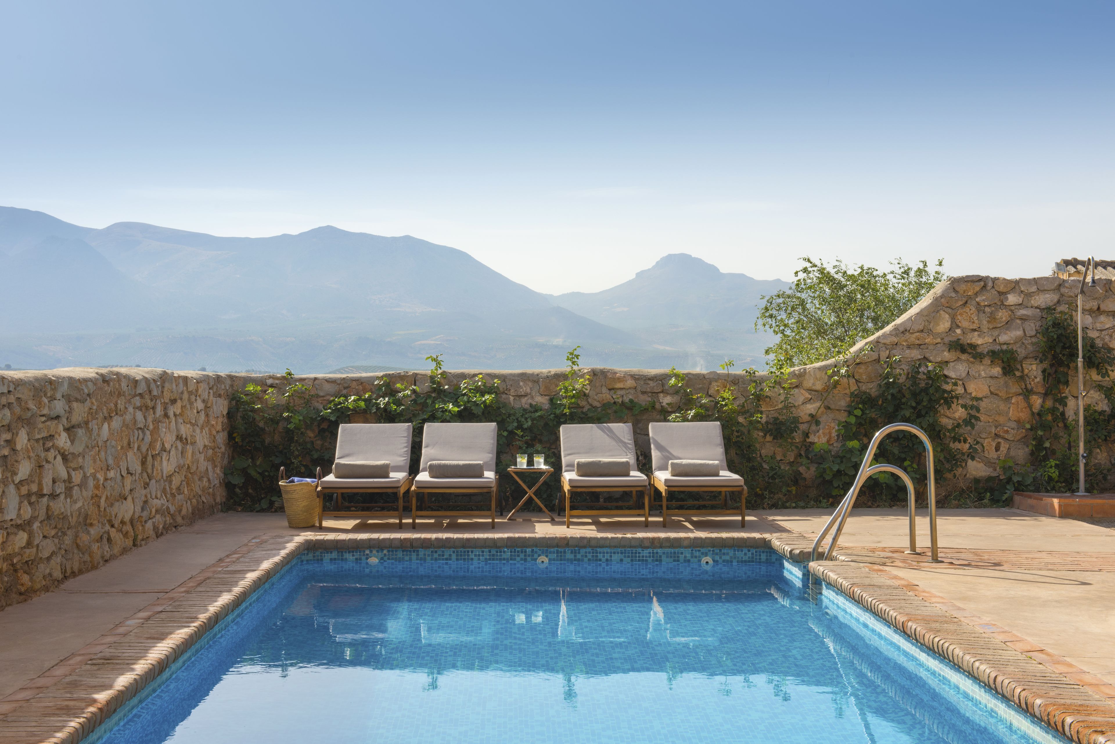 seasonal outdoor pool, pool umbrellas, pool loungers