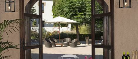 Breakfast, lunch, dinner served; Mediterranean cuisine, garden views