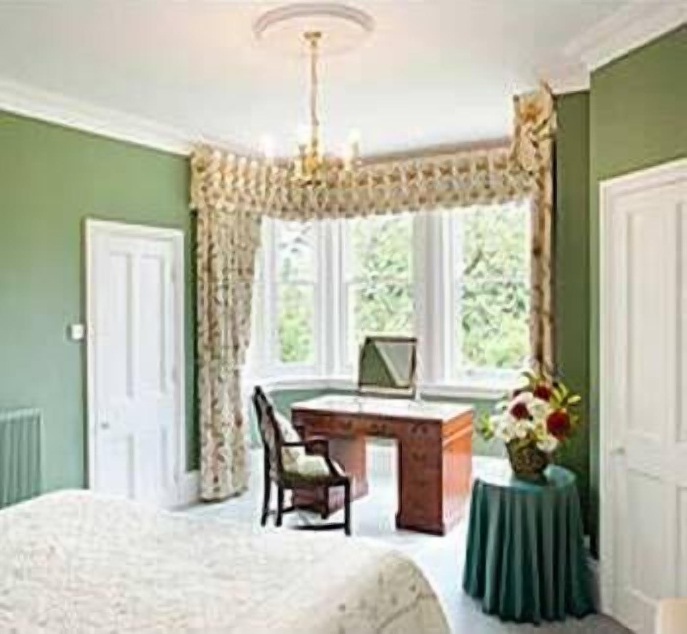 individually decorated, individually furnished, desk, blackout curtains