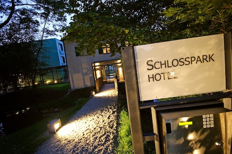 Front of property – evening/night. Schlossparkhotel Mariakirchen