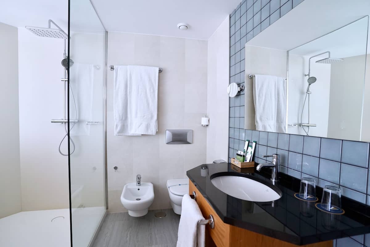 junior suite, terrace | bathroom | hair dryer, bidet, towels