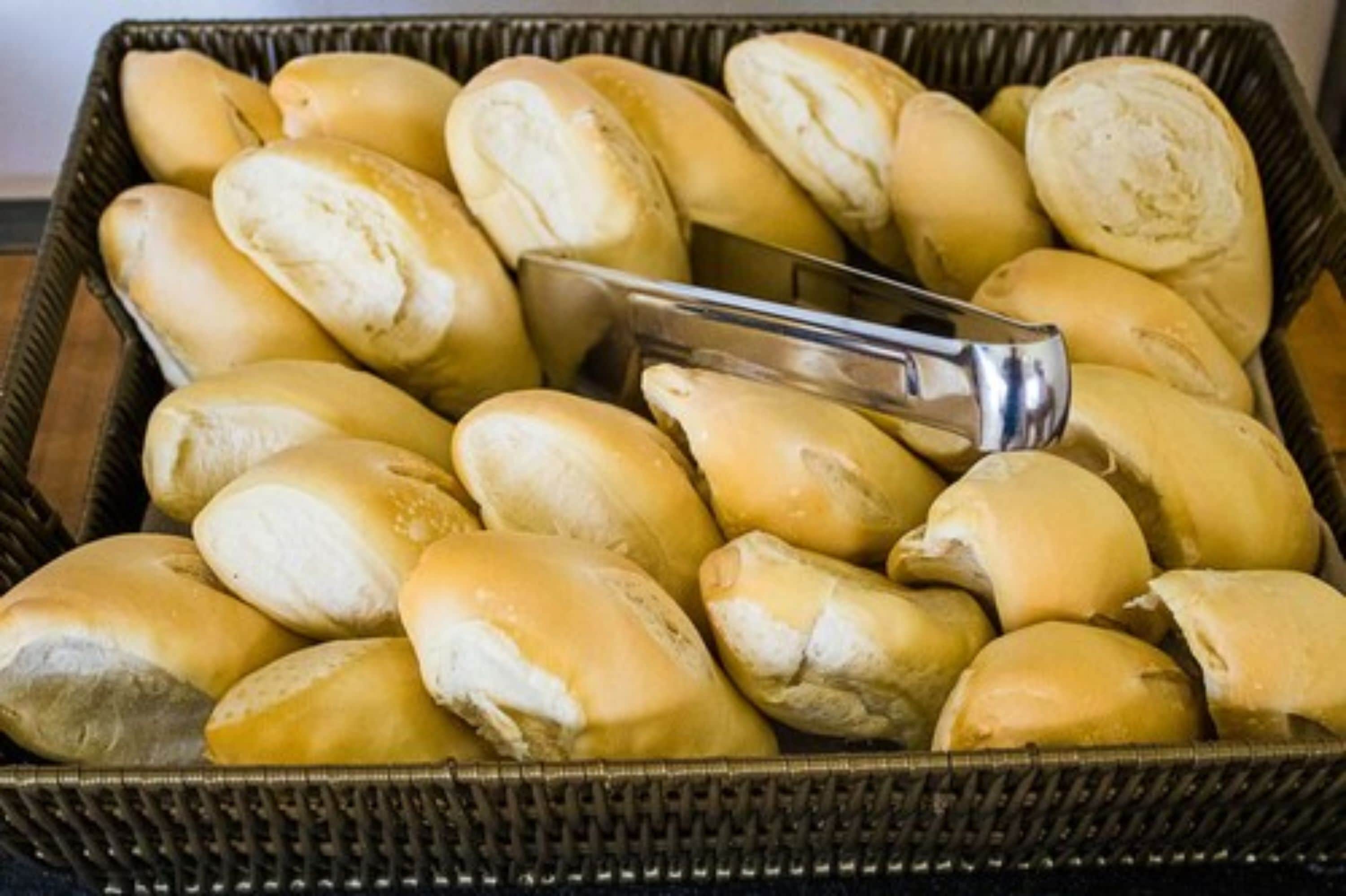 A basket filled with baguettes.