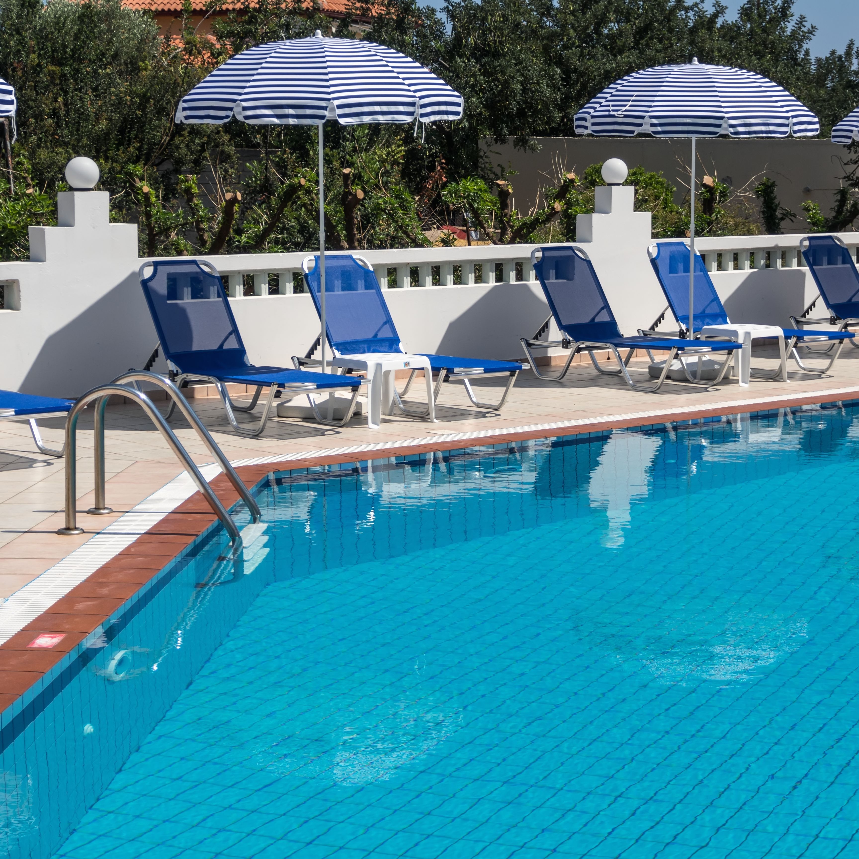 Seasonal outdoor pool, pool umbrellas, sun loungers