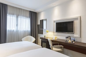 Premium bedding, down duvets, minibar, in-room safe