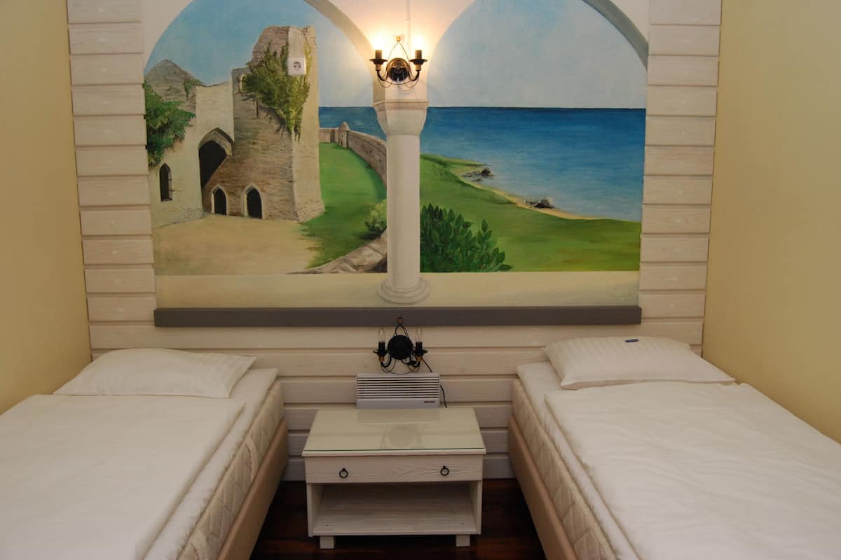 deluxe family room | minibar, in-room safe, desk, rollaway beds