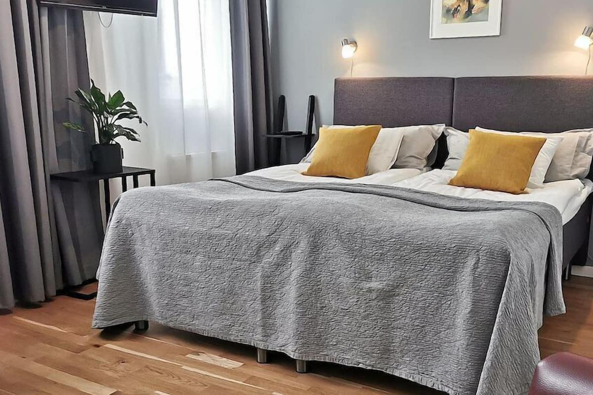 Family Room (4 adults) | 1 bedroom, blackout drapes, free WiFi, bed sheets