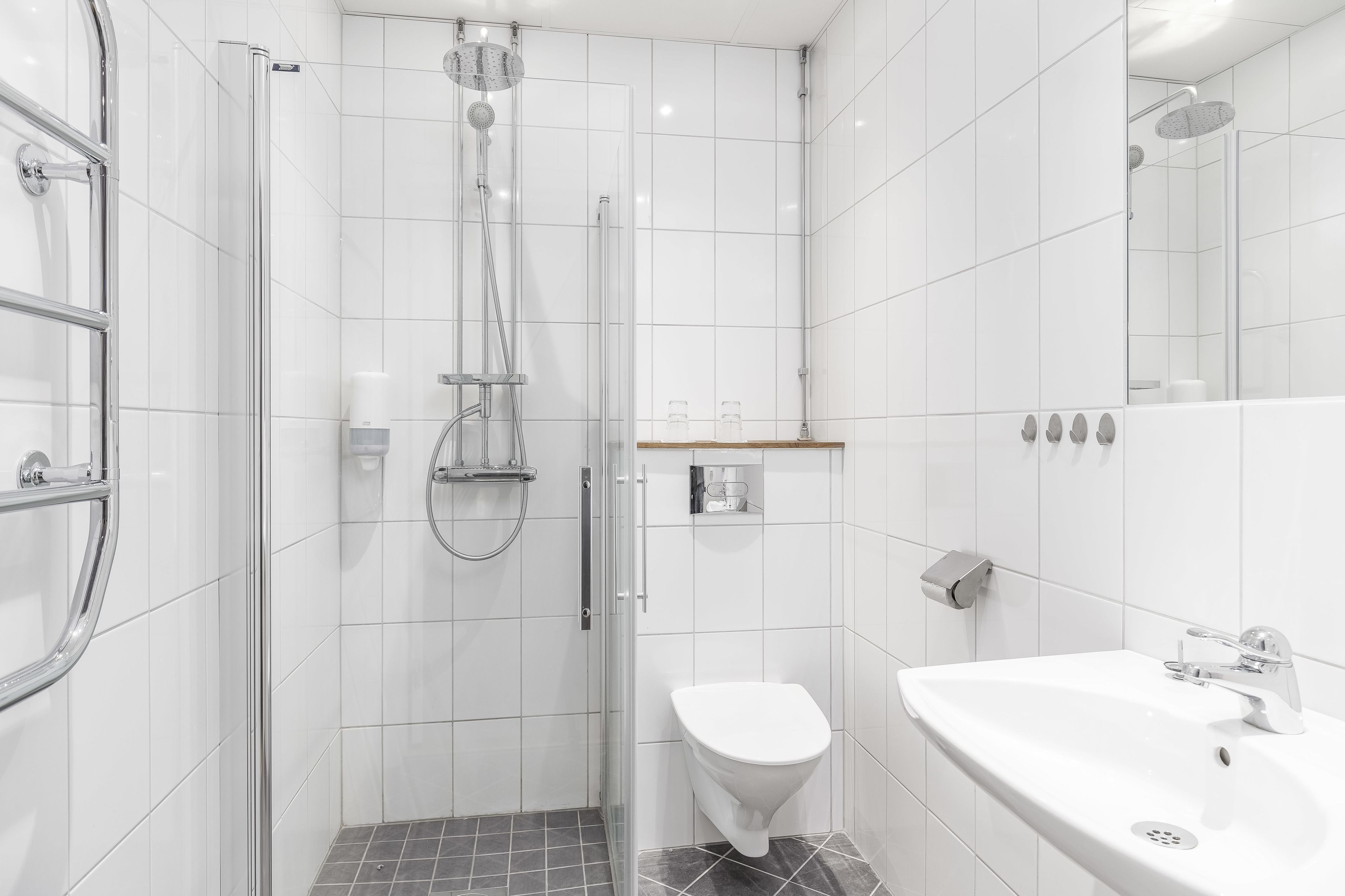 Double Room | Bathroom | Hair dryer (on request), heated floors (bathroom), towels, soap