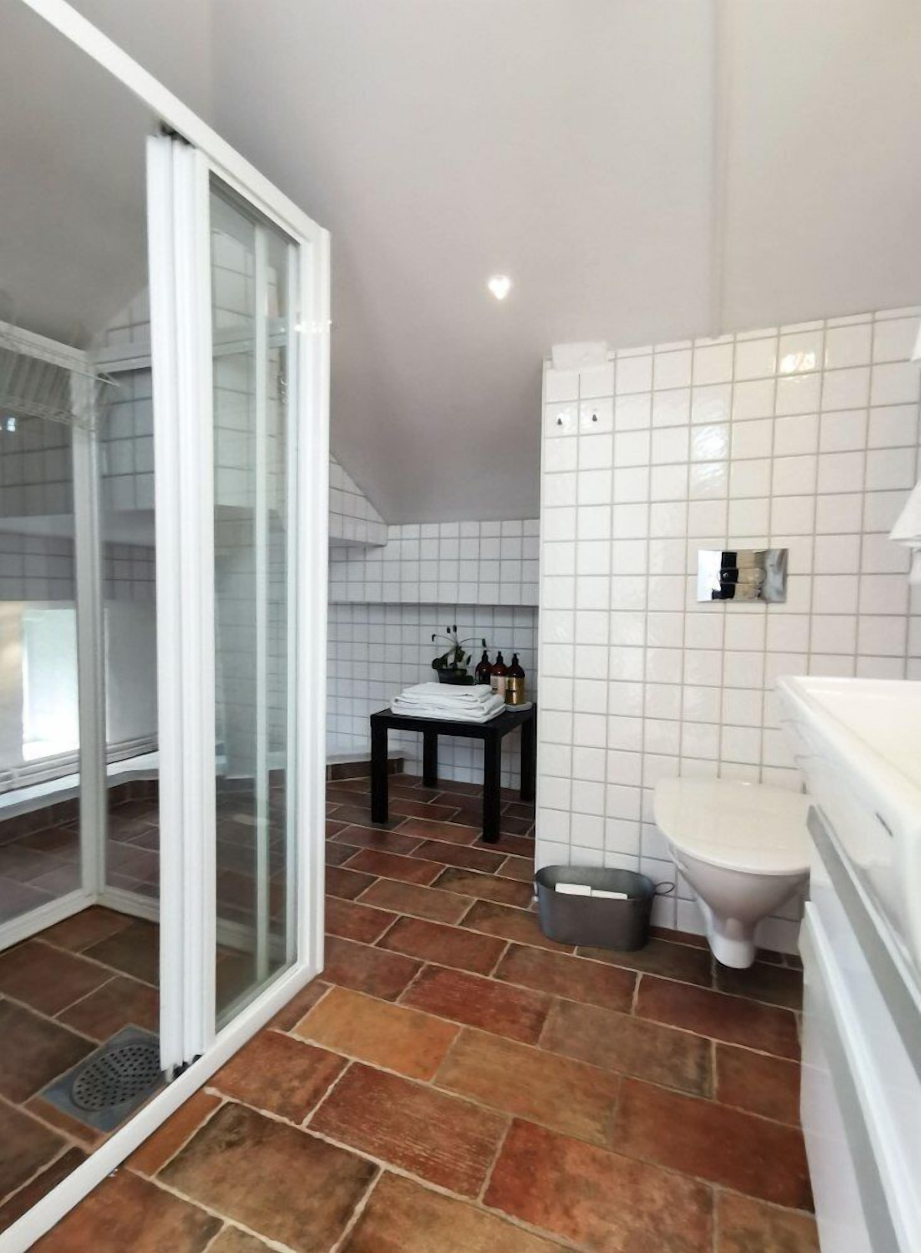 suite | bathroom | hair dryer, heated floors, towels, soap