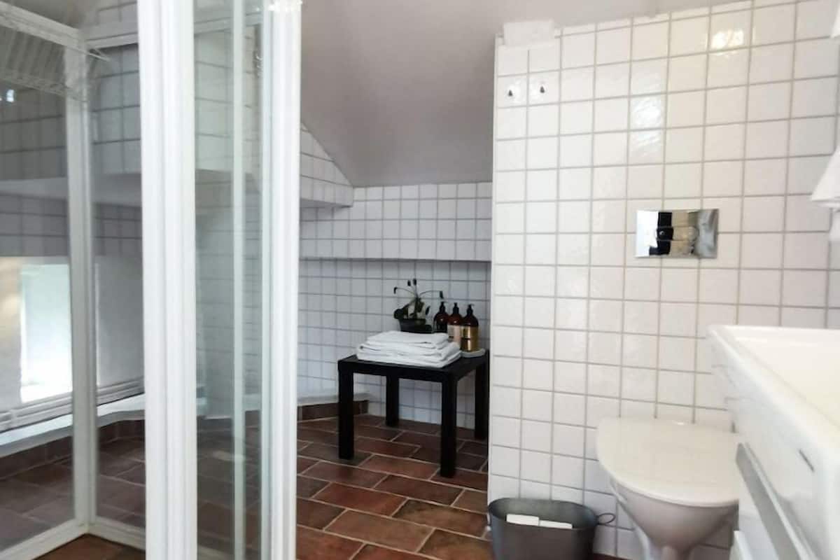 suite | bathroom | hair dryer, heated floors, towels, soap