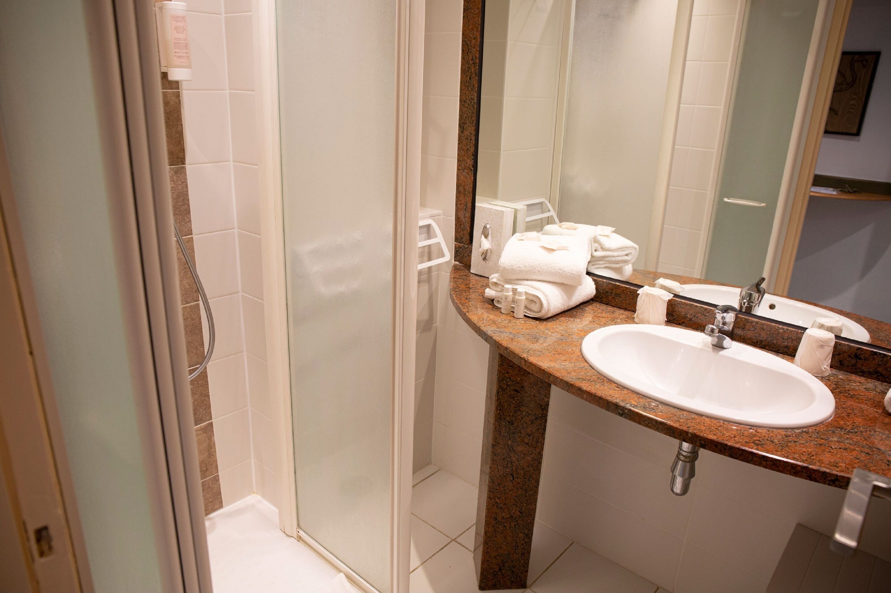 living room, terrace, sea view | bathroom | shower, free toiletries, hair dryer, towels