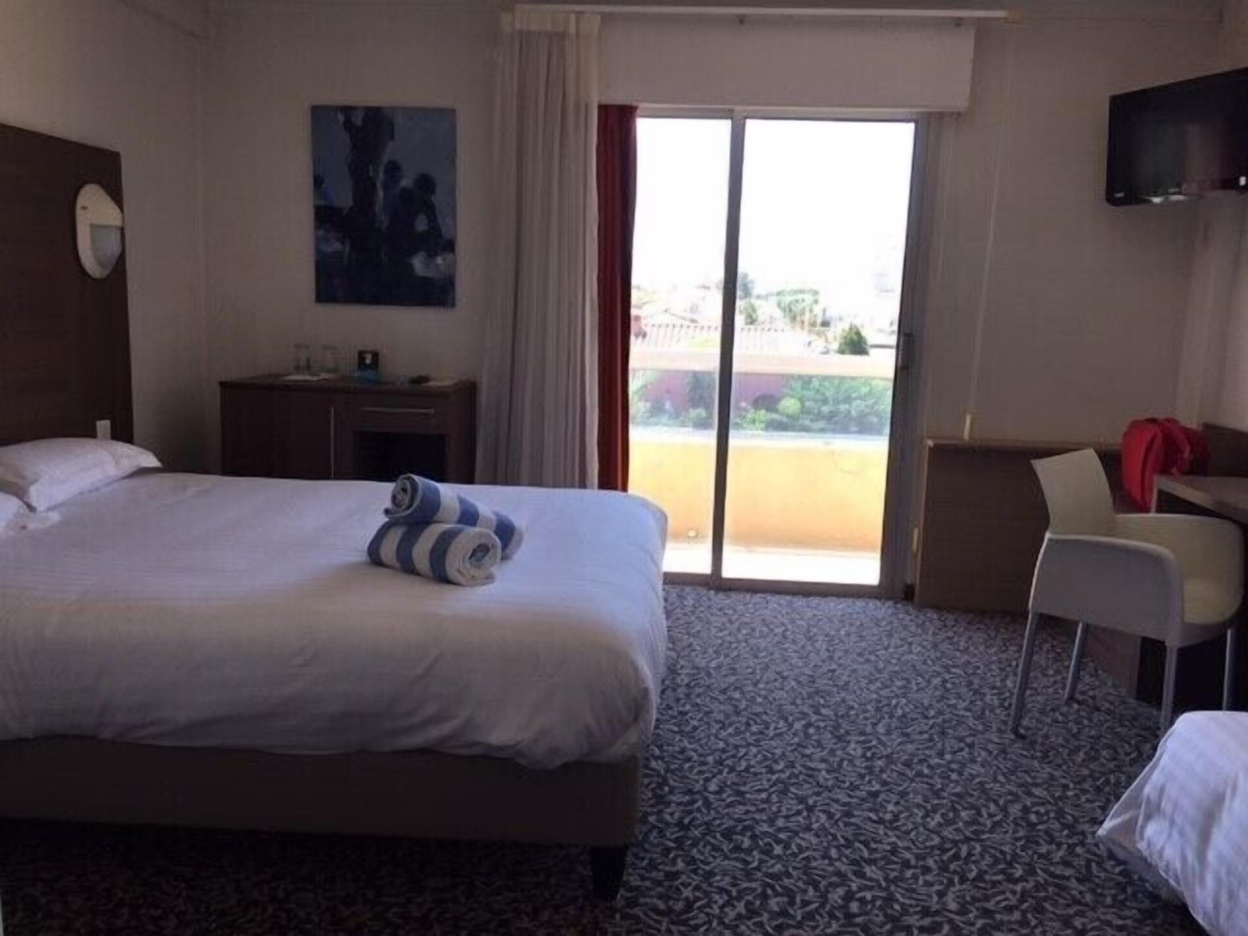 superior family room | premium bedding, minibar, in-room safe, desk