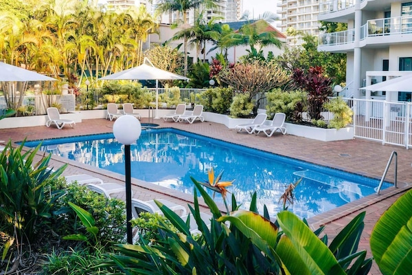 Indoor pool, outdoor pool, pool umbrellas, pool loungers