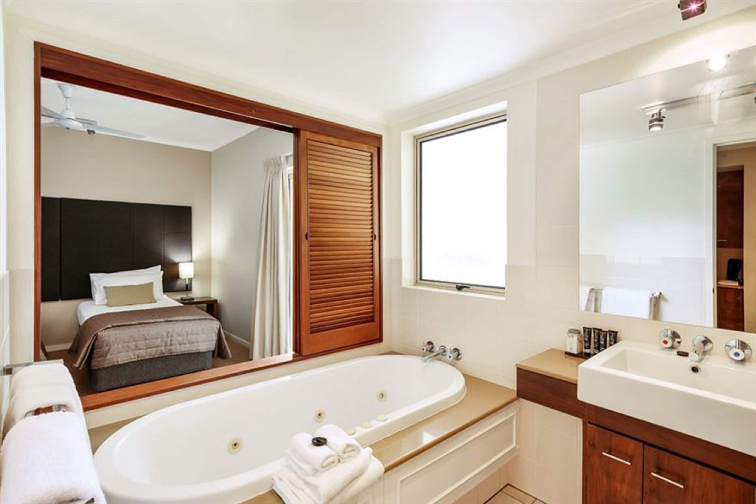 hotel spa room | bathroom | separate bathtub and shower, free toiletries, hair dryer, towels
