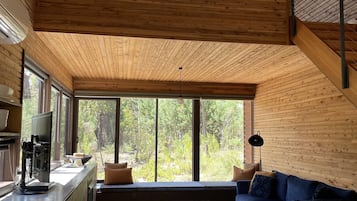 Tree House, 1 King Bed | Living area | LCD TV, fireplace, DVD player