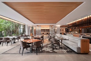 Breakfast, lunch, dinner served; international cuisine, garden views