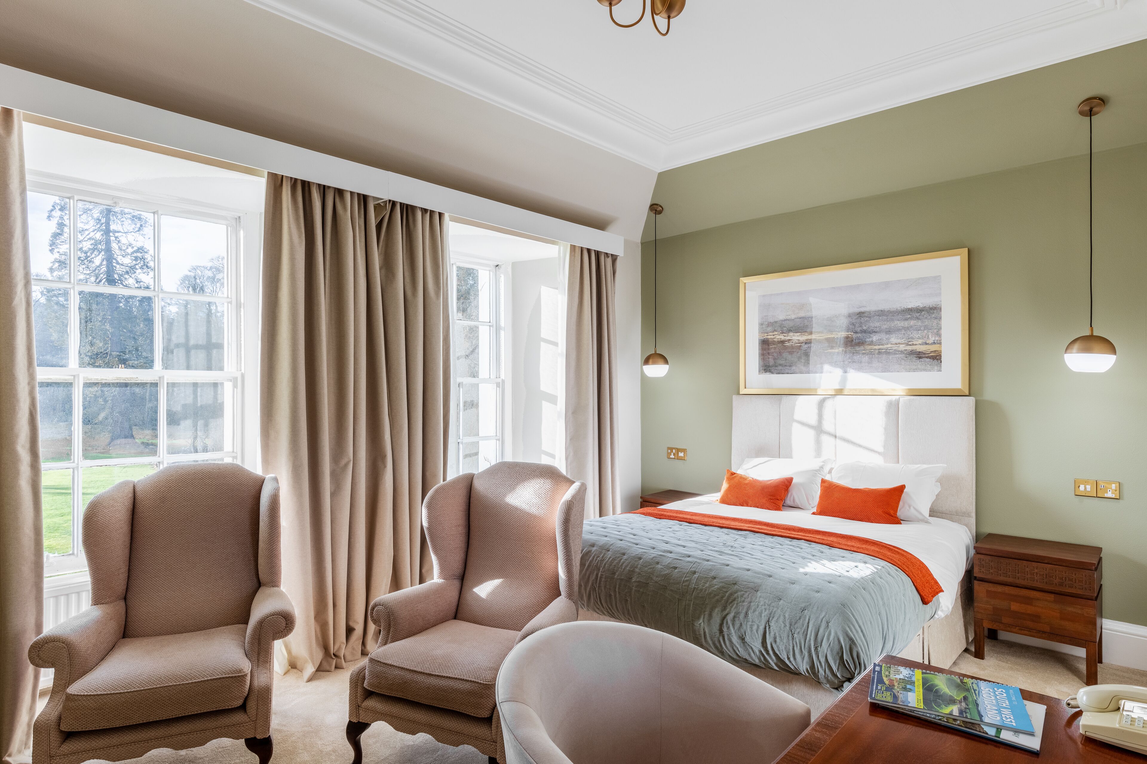 deluxe family room | 1 bedroom, individually decorated, individually furnished, desk