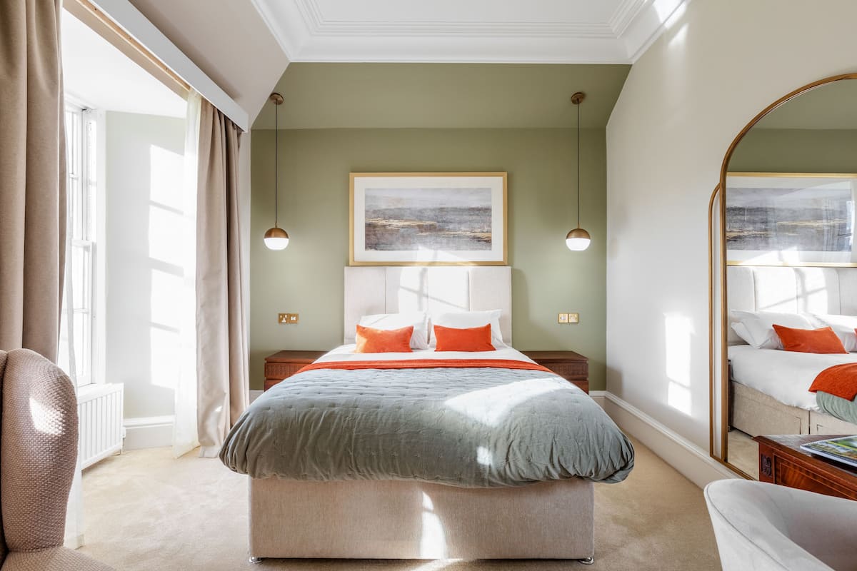 deluxe family room | 1 bedroom, individually decorated, individually furnished, desk