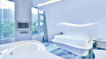 Deluxe Room | Premium bedding, down comforters, in-room safe, desk
