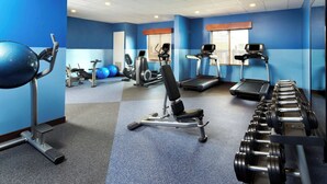 A gym with treadmills, elliptical machines, and free weights. - Four Points by Sheraton Houston Hobby Airport (Houston)