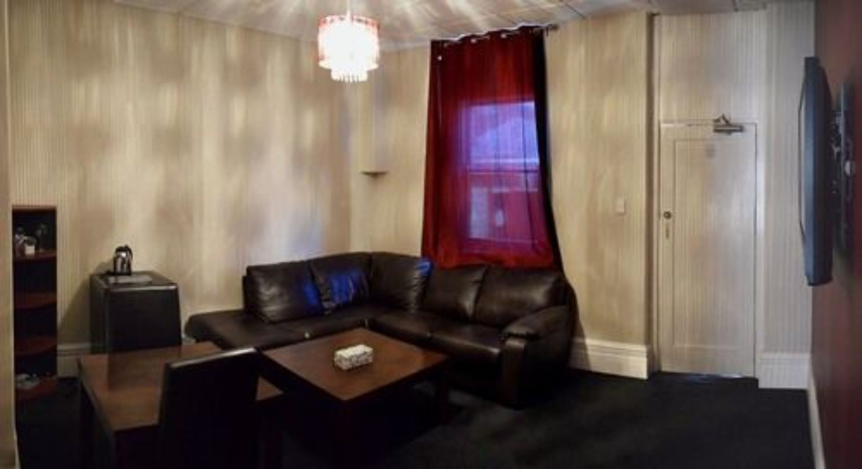 one-bedroom suite | living area | tv