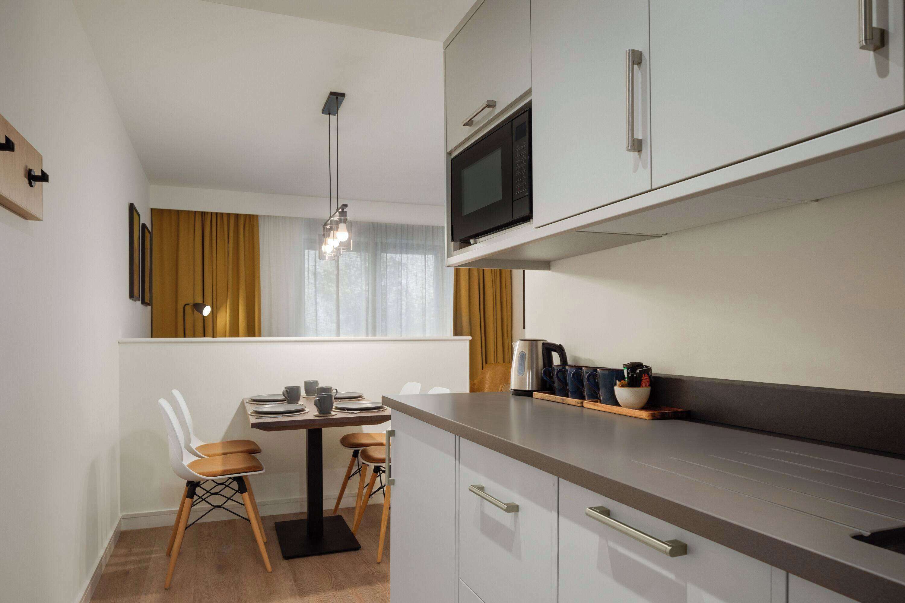 Apartment, Multiple Beds | Desk, laptop workspace, blackout curtains, iron/ironing board