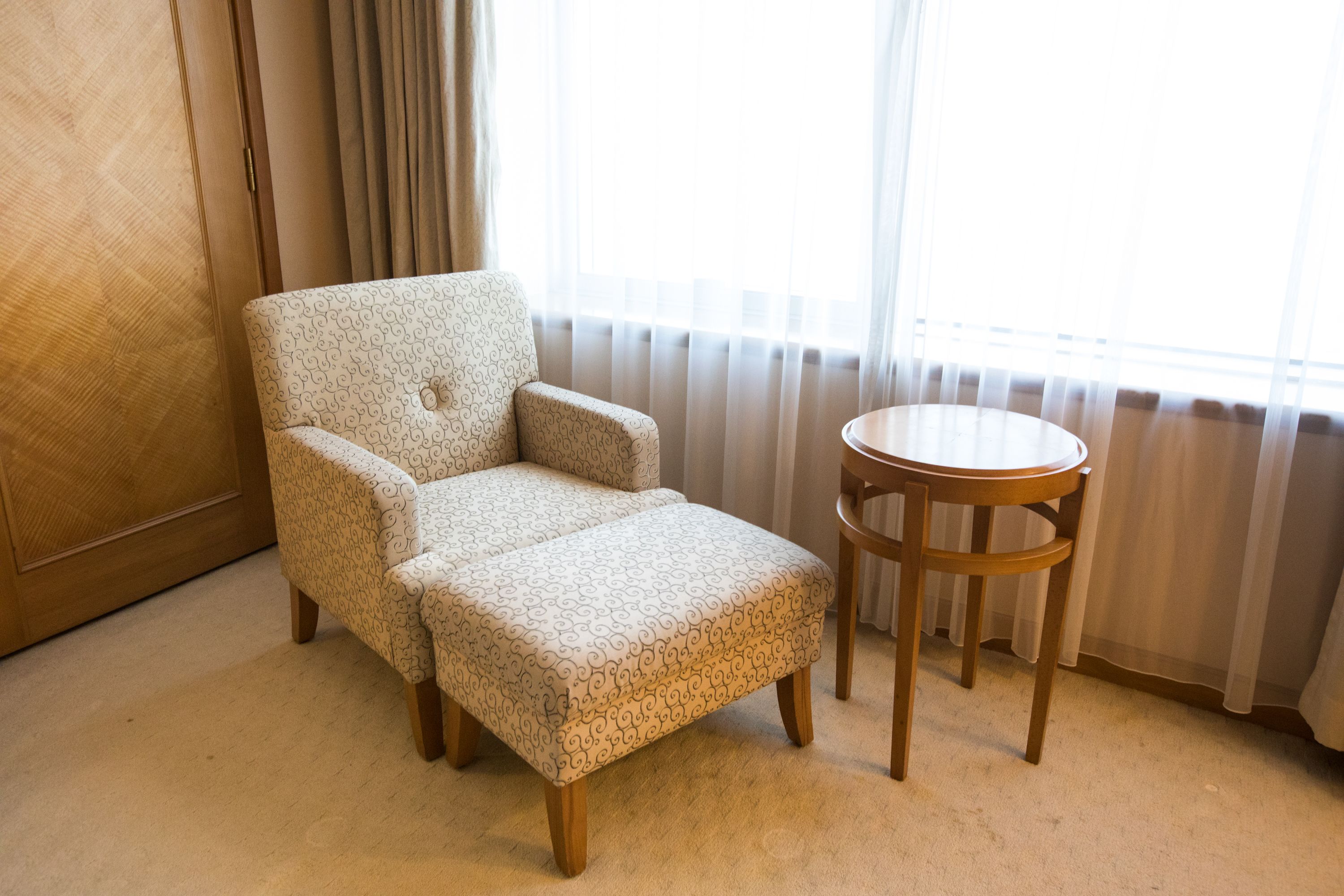 executive double or twin room | living area | tv