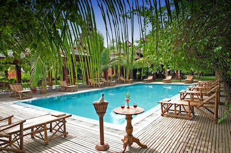 Outdoor pool. Thazin Garden Hotel