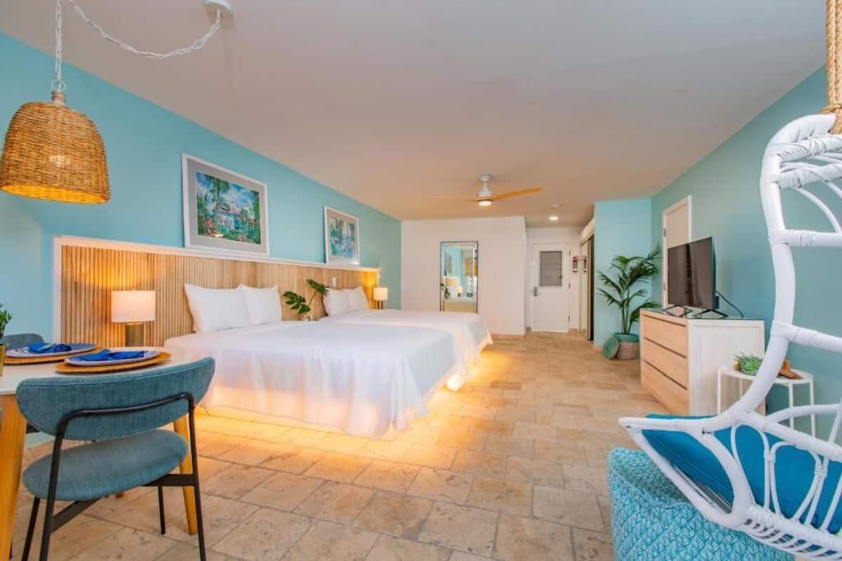 deluxe room, 2 queen beds, balcony, oceanfront | 1 bedroom, pillow-top beds, in-room safe, desk