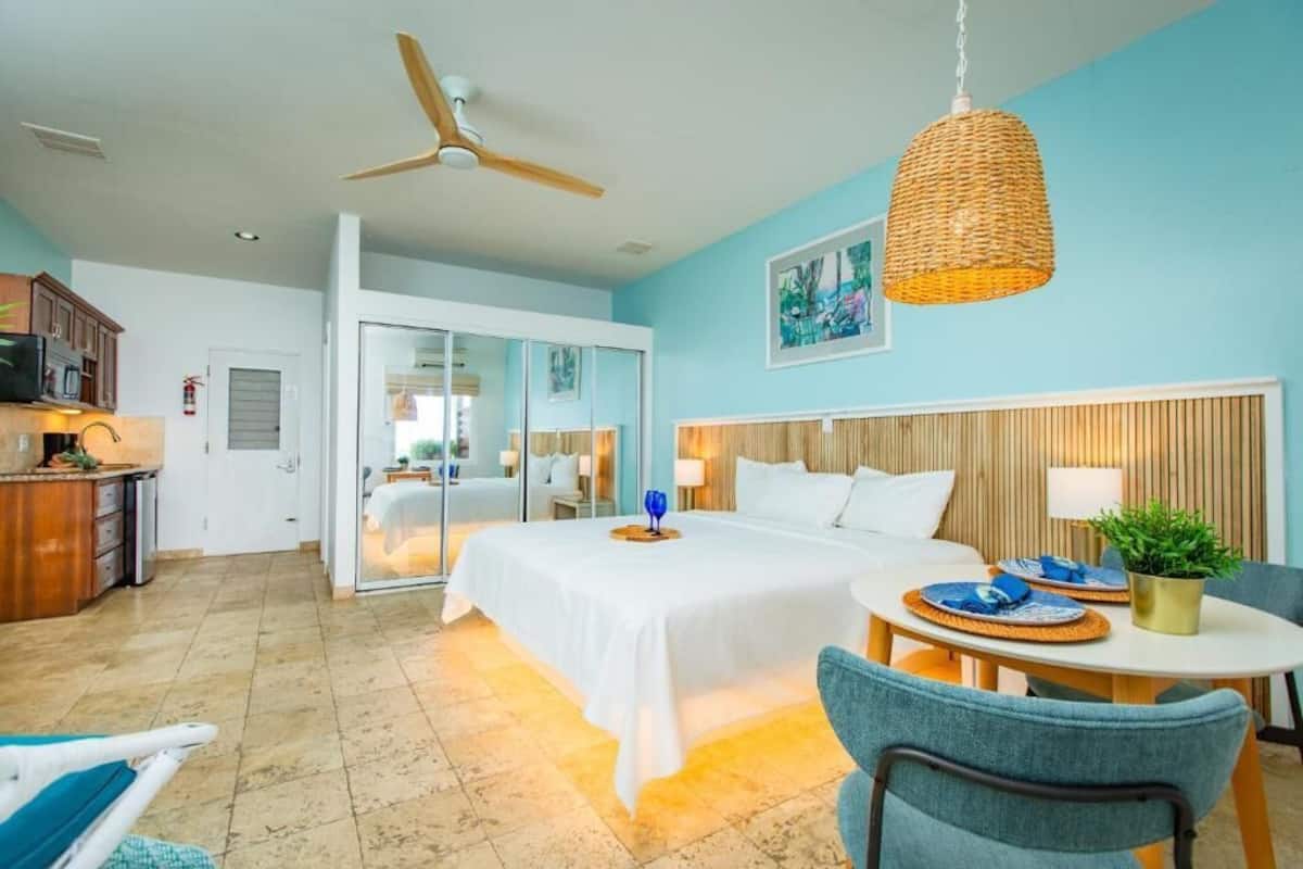 superior room, 1 king bed, kitchenette, oceanfront | 1 bedroom, pillow-top beds, in-room safe, desk