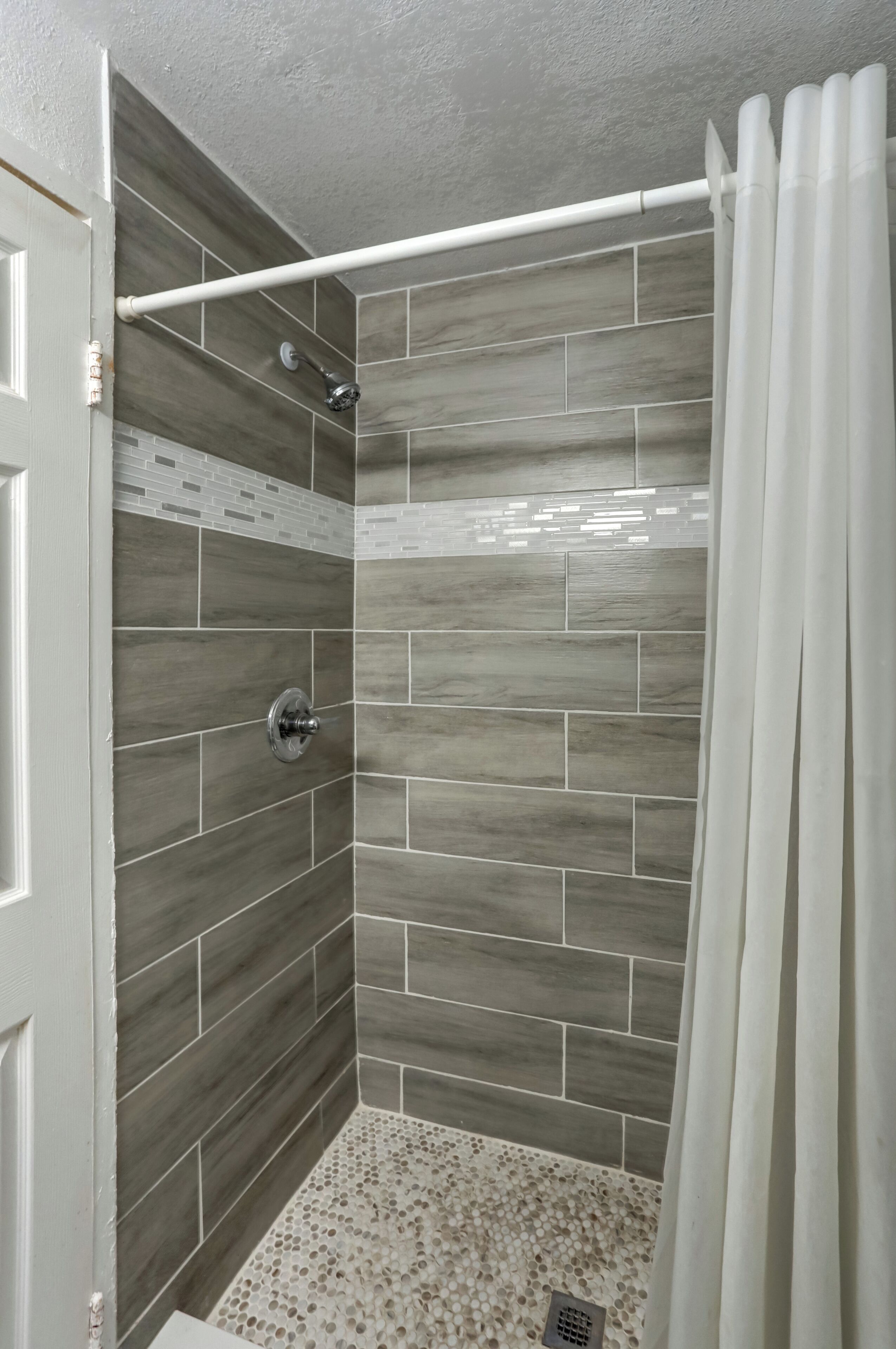 Combined shower/bathtub, hair dryer