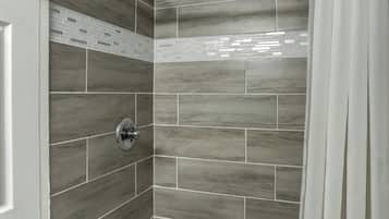 Combined shower/bathtub, hair dryer
