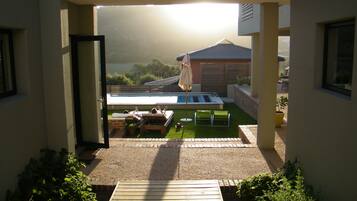 2 outdoor pools, pool umbrellas, pool loungers