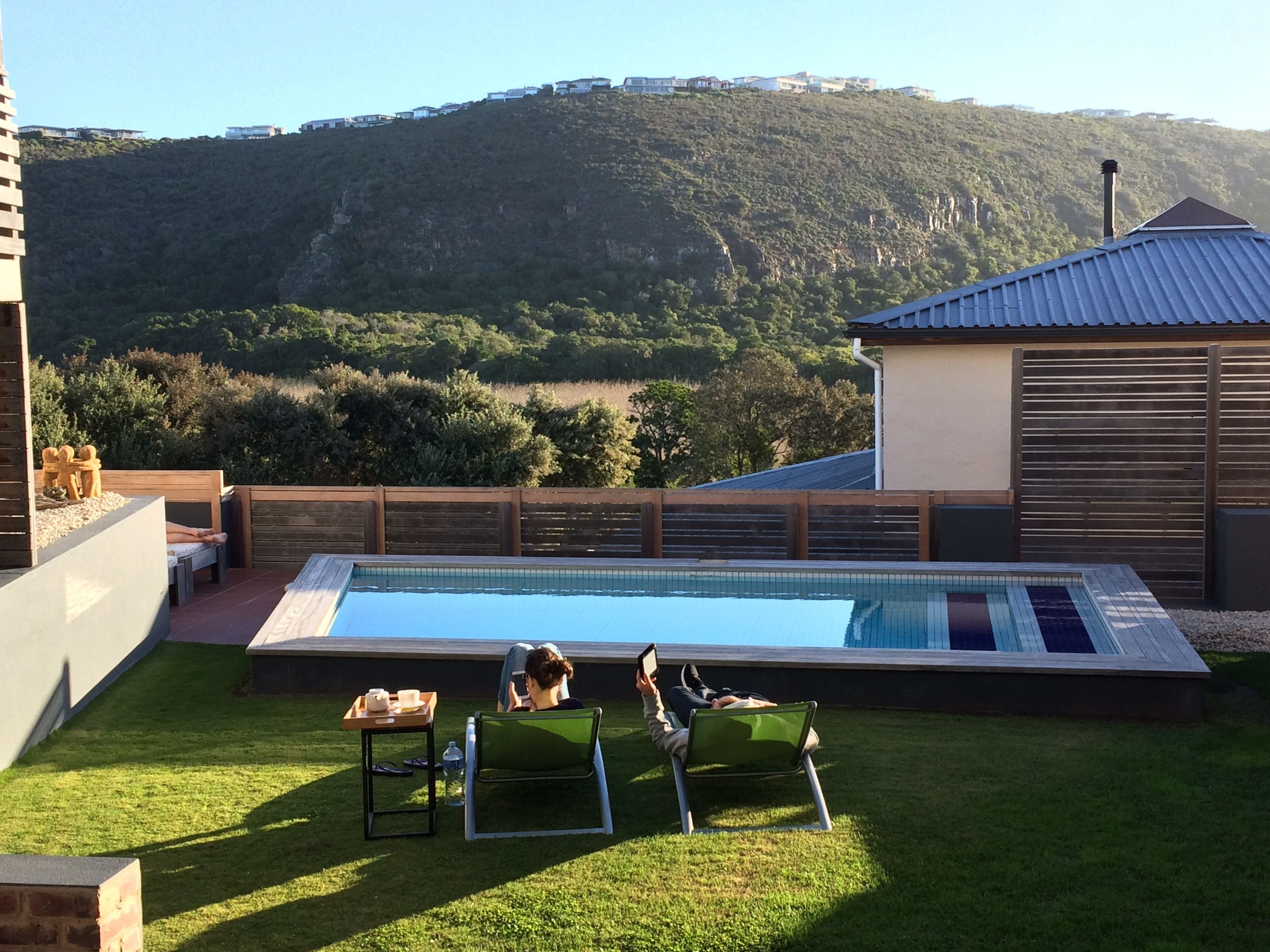 2 outdoor pools, pool umbrellas, pool loungers