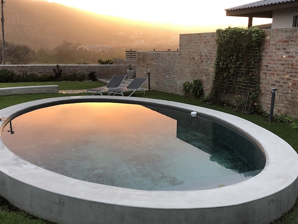 2 outdoor pools, pool umbrellas, pool loungers