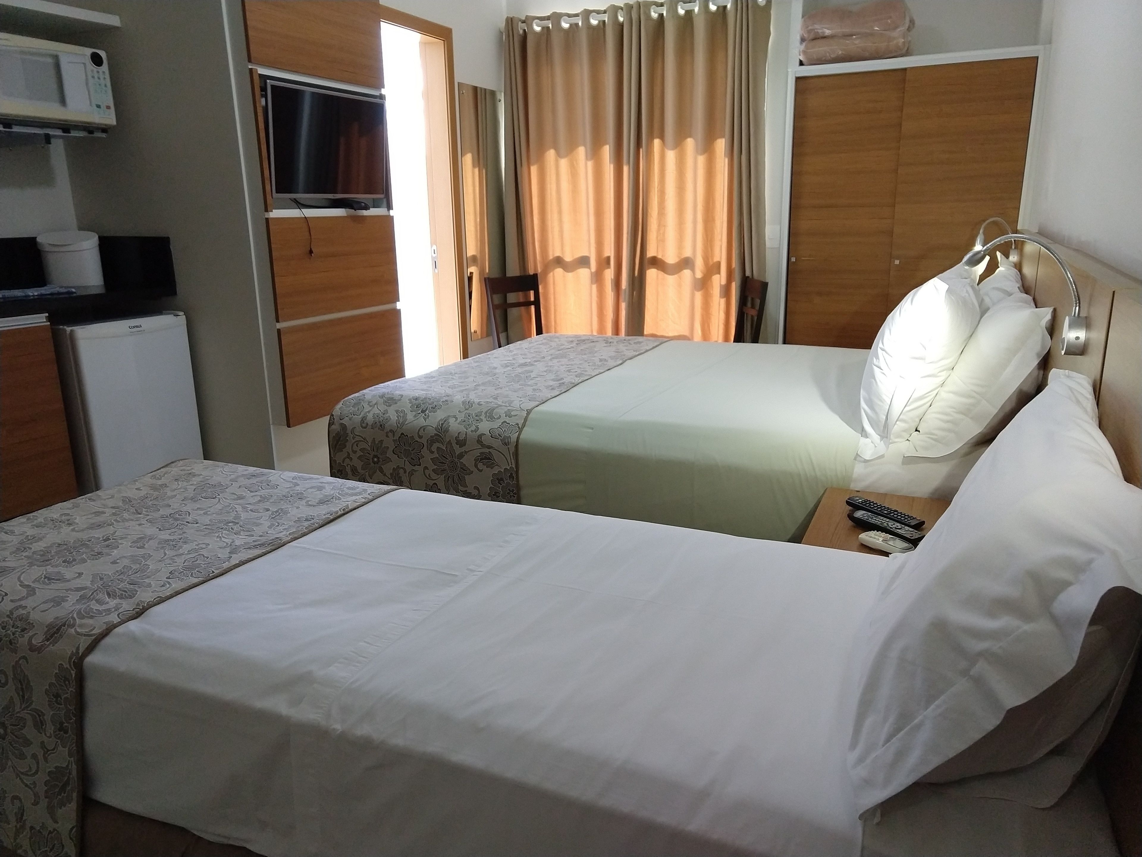 standard triple room | minibar, in-room safe, desk, blackout curtains