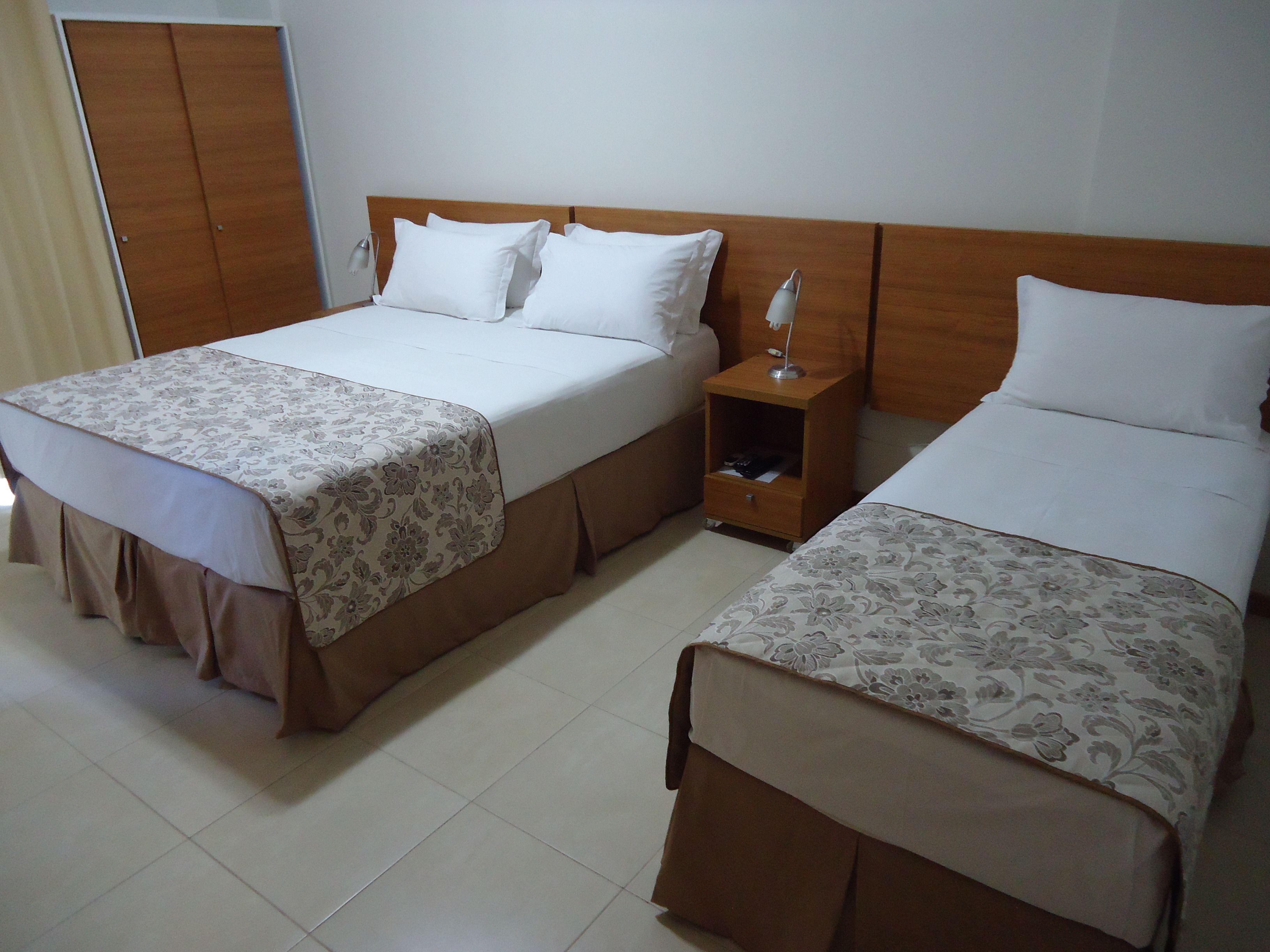 standard triple room | minibar, in-room safe, desk, blackout curtains