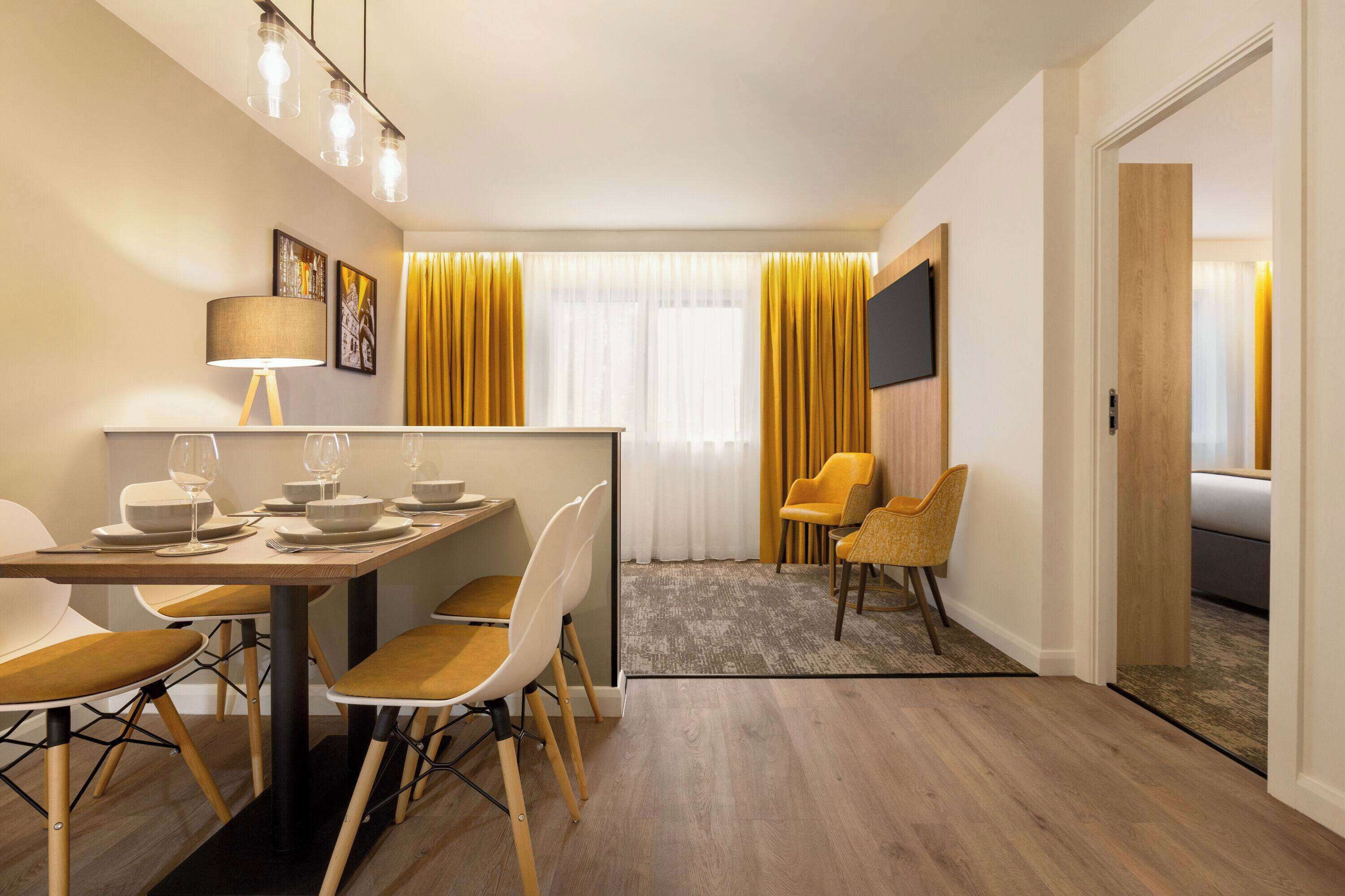 apartment, 2 bedrooms (1 king, 2 twin, and 1 sofabed) | desk, laptop workspace, free cots/infant beds, free wifi