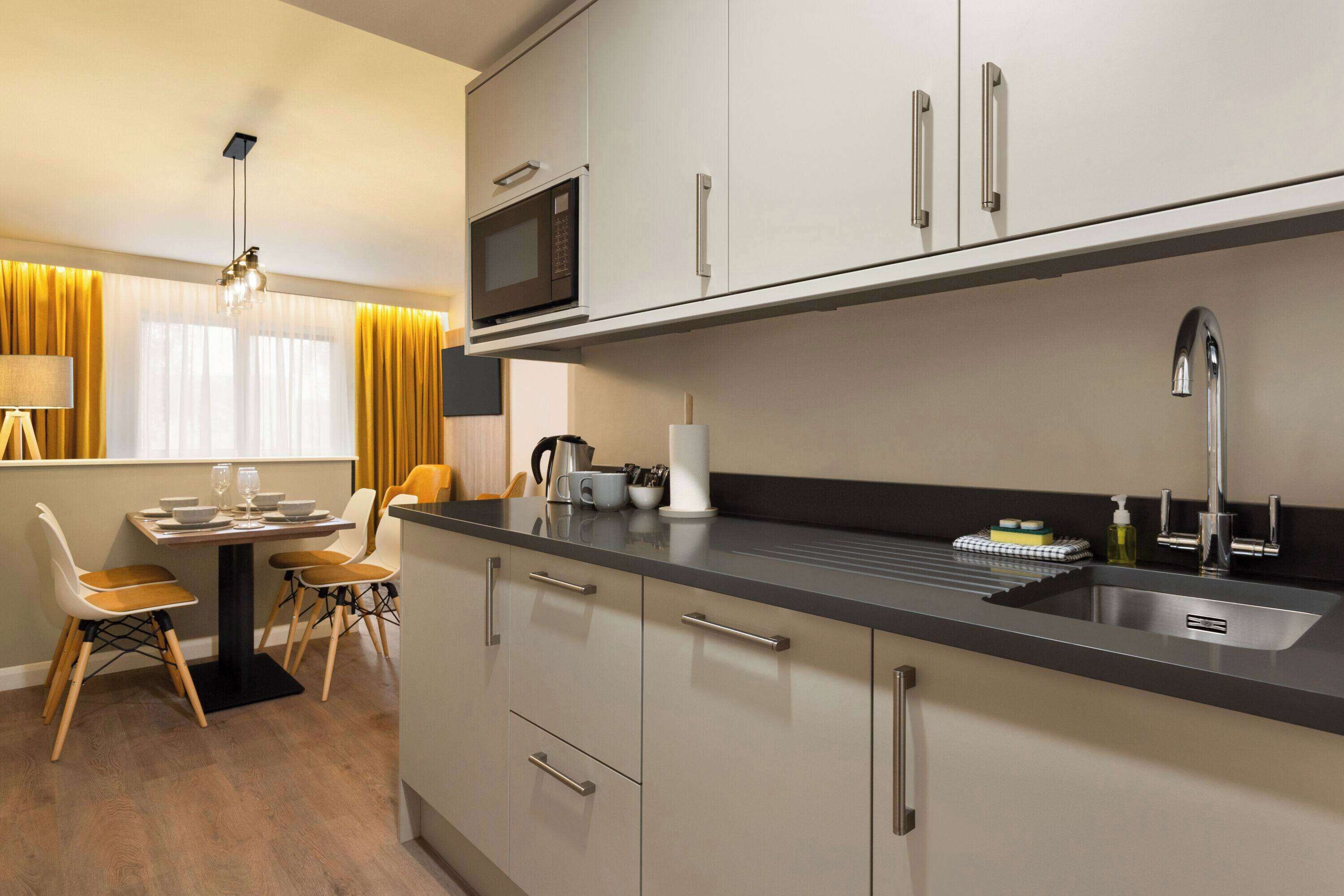 apartment, 2 bedrooms (1 king, 2 twin, and 1 sofabed) | desk, laptop workspace, free cots/infant beds, free wifi