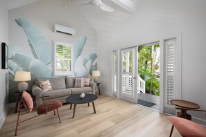 Cottage, 2 Bedrooms (Royal Poinciana) | Living area | 37-inch flat-screen TV with cable channels, TV - Paradise Inn Key West - Adults Only (Key West)