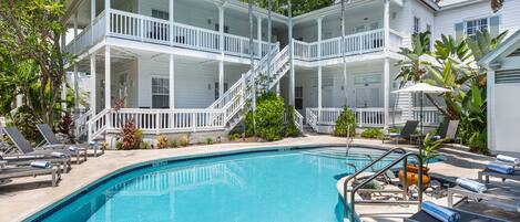 Outdoor pool, pool umbrellas, sun loungers