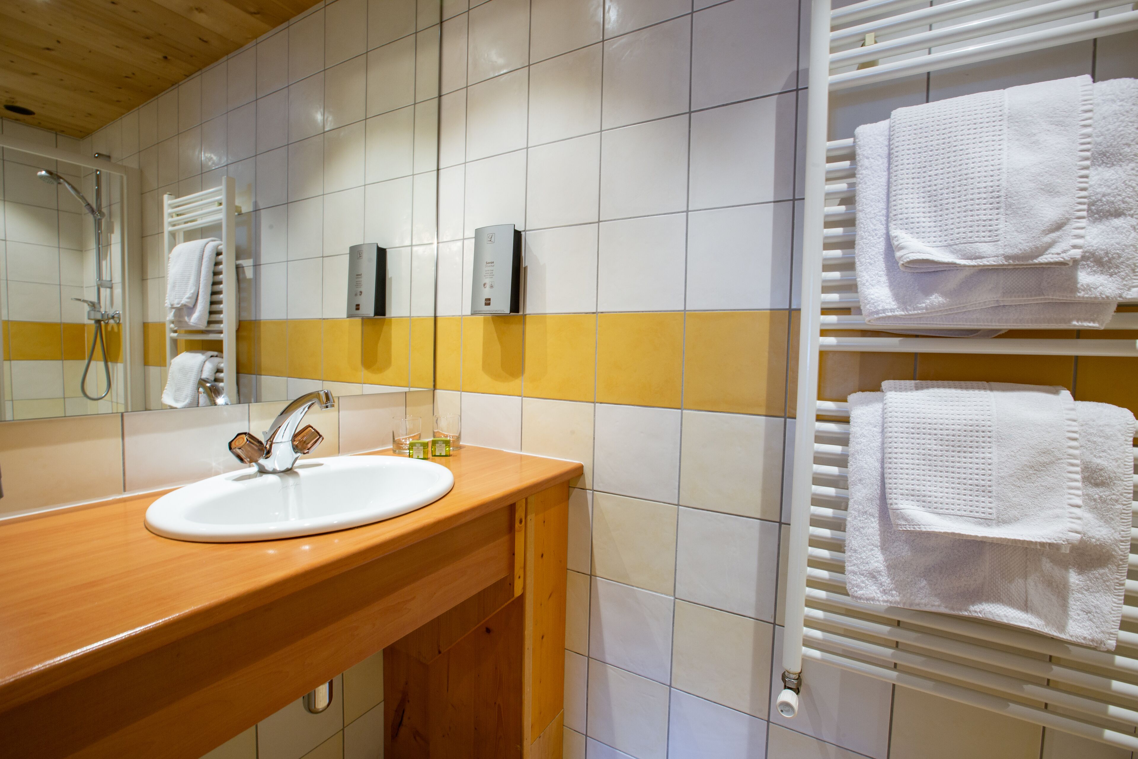 superior twin room | bathroom | free toiletries, hair dryer, towels, soap